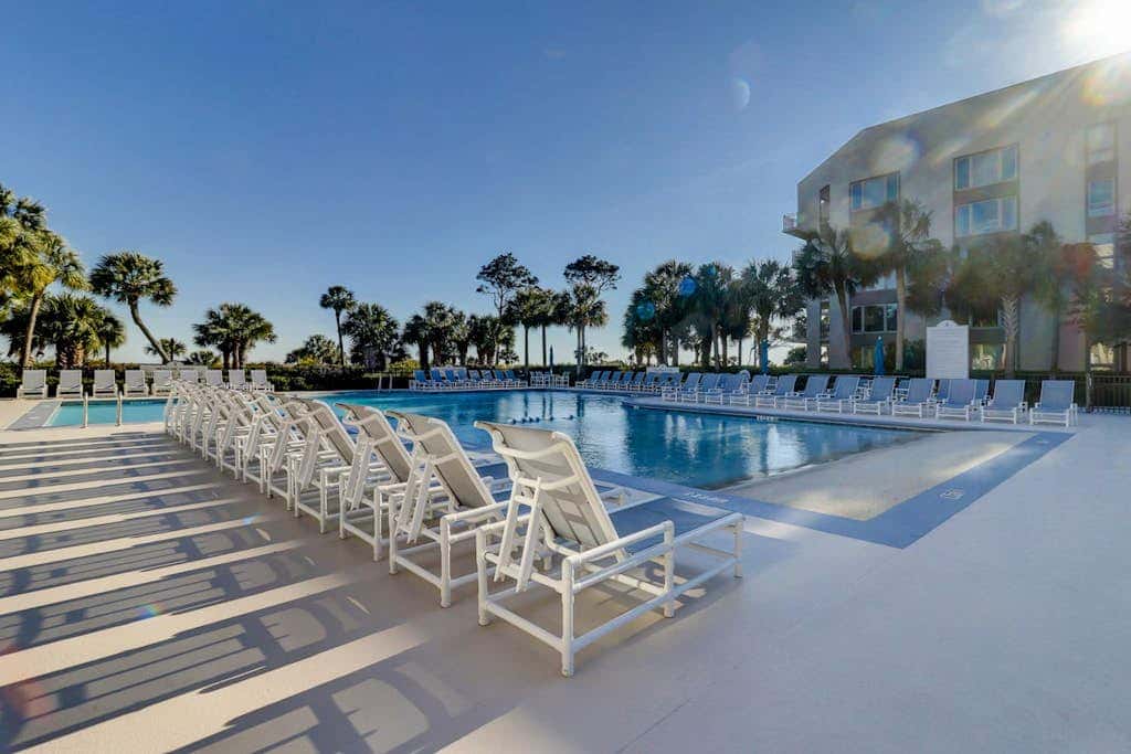 First Floor Condo near the beach with beach gear, washer and dryer, and pool