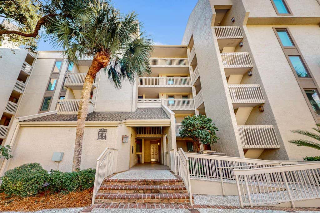 First Floor Condo near the beach with beach gear, washer and dryer, and pool