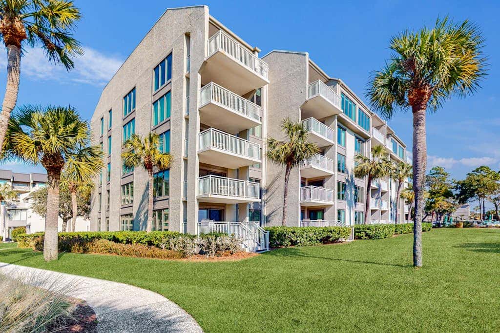 First Floor Condo near the beach with beach gear, washer and dryer, and pool