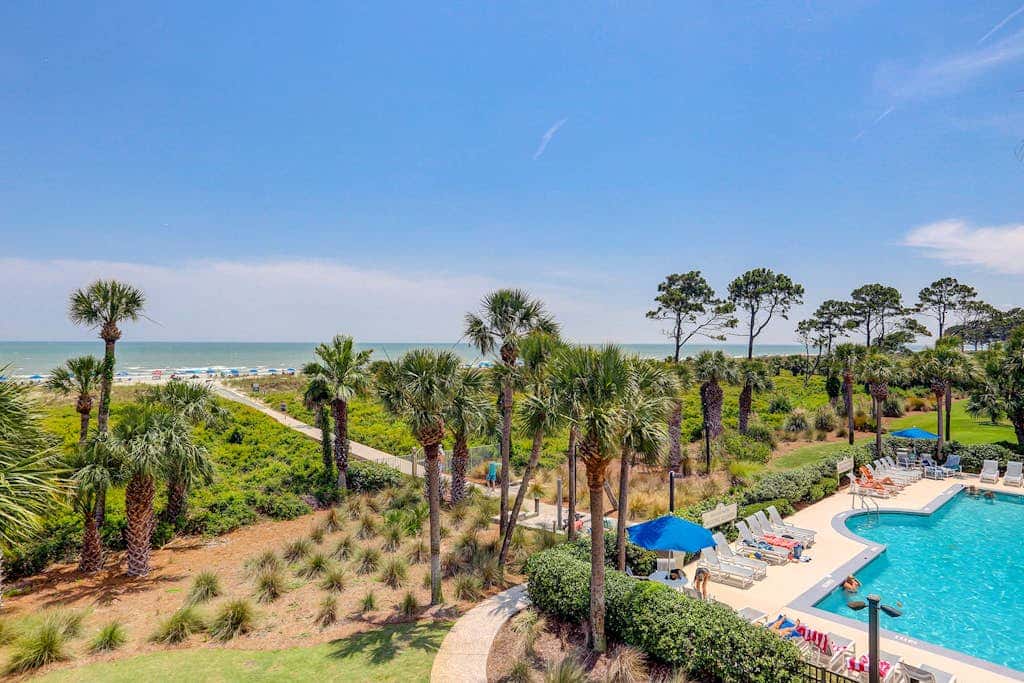 First Floor Condo near the beach with beach gear, washer and dryer, and pool