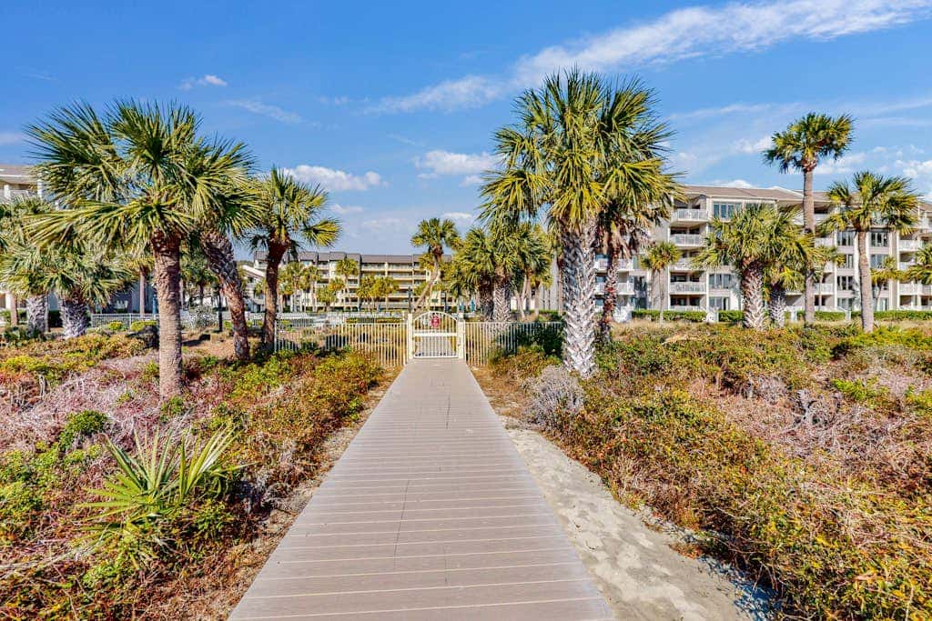 First Floor Condo near the beach with beach gear, washer and dryer, and pool