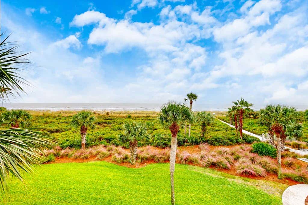 First Floor Condo near the beach with beach gear, washer and dryer, and pool