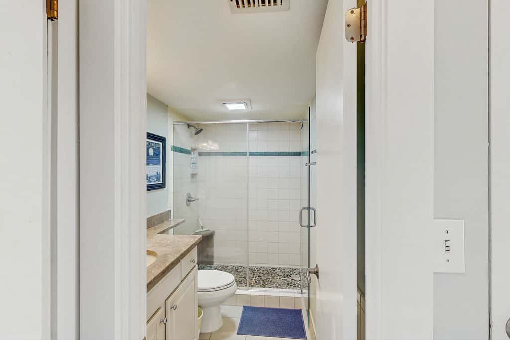 First Floor Condo near the beach with beach gear, washer and dryer, and pool