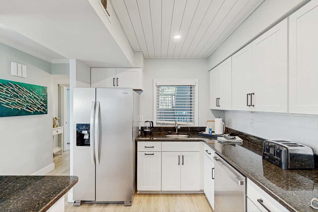 First Floor Condo near the beach with beach gear, washer and dryer, and pool