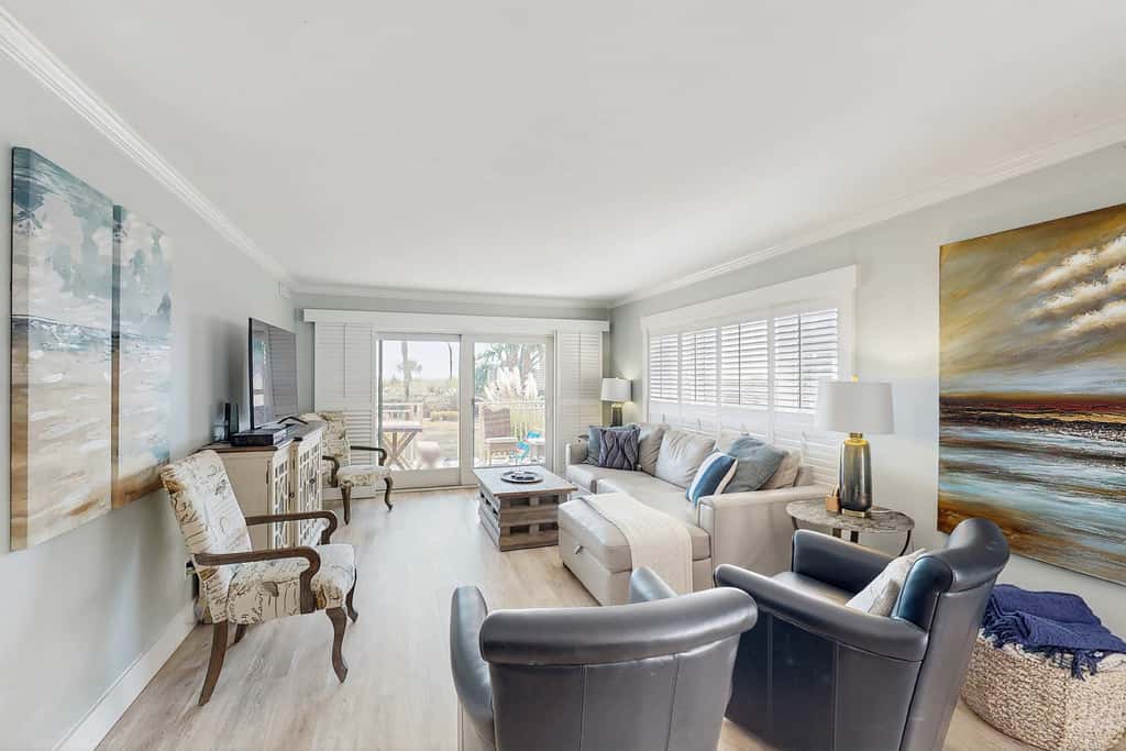 First Floor Condo near the beach with beach gear, washer and dryer, and pool