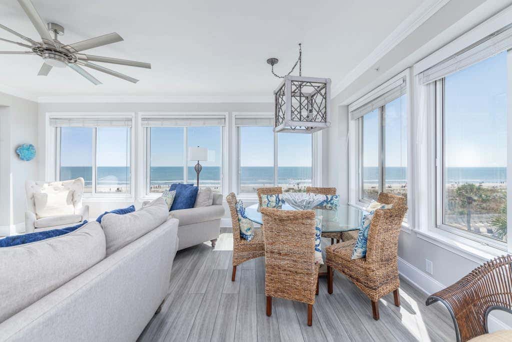 Panoramic direct oceanfront view condo with pool, hot tub, gym & steps to beach