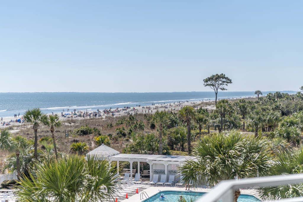Panoramic direct oceanfront view condo with pool, hot tub, gym & steps to beach