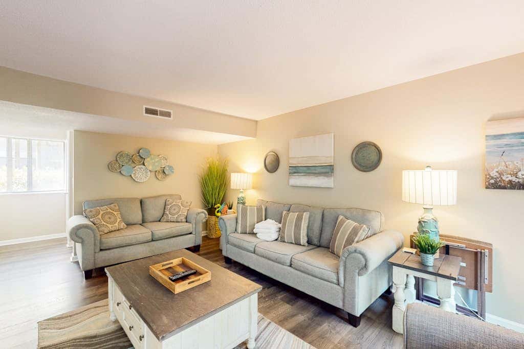 Coastal condo with outdoor pool, walk to beach and shopping