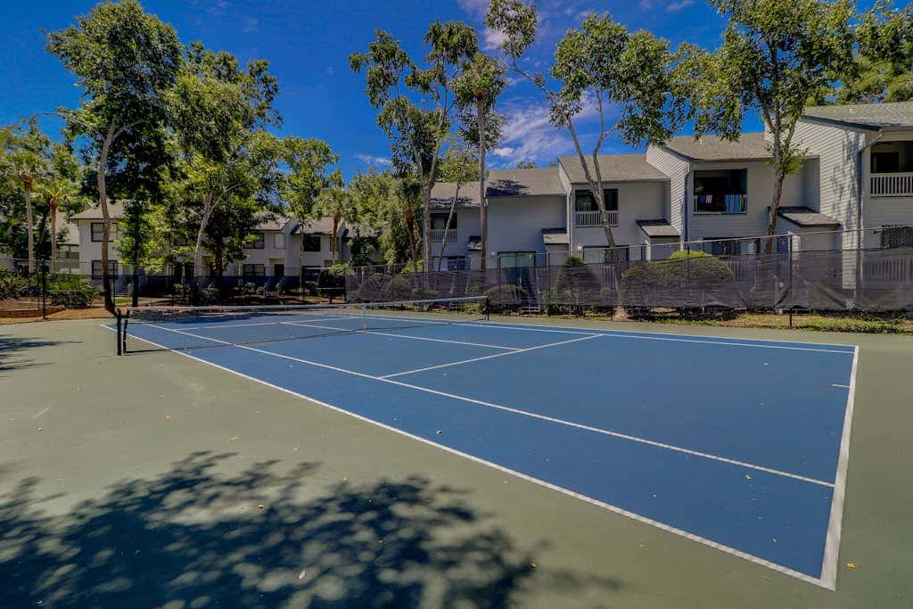 Coastal condo with outdoor pool, walk to beach and shopping