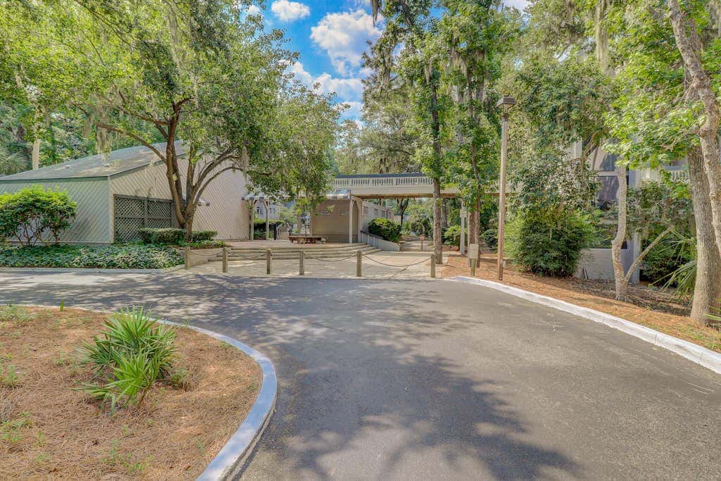 Coastal condo with outdoor pool, walk to beach and shopping