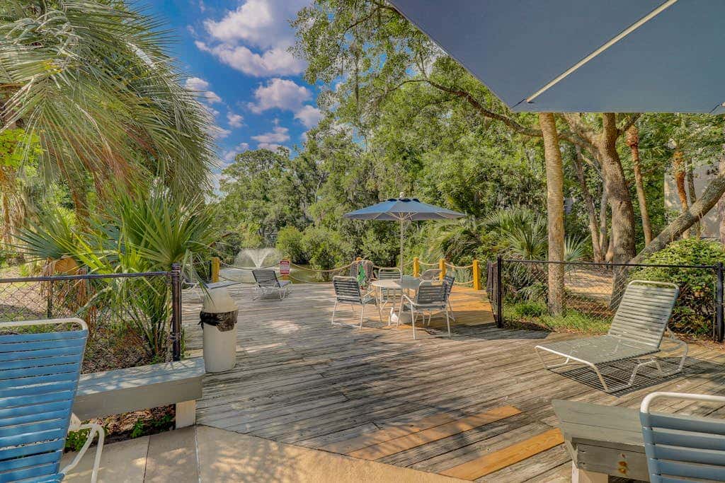 Coastal condo with outdoor pool, walk to beach and shopping