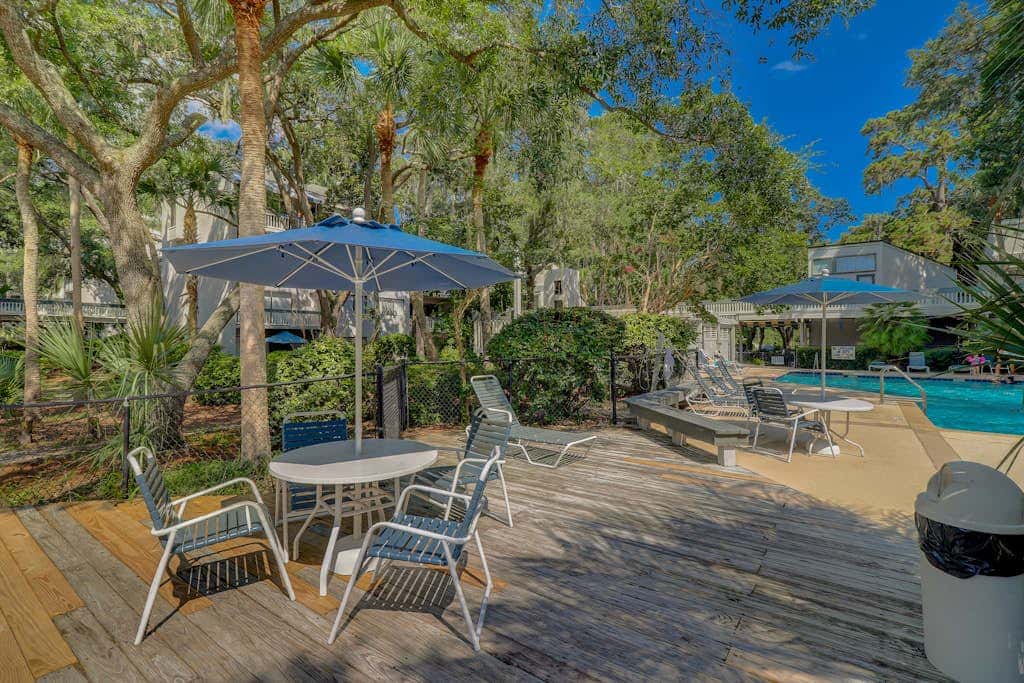 Coastal condo with outdoor pool, walk to beach and shopping