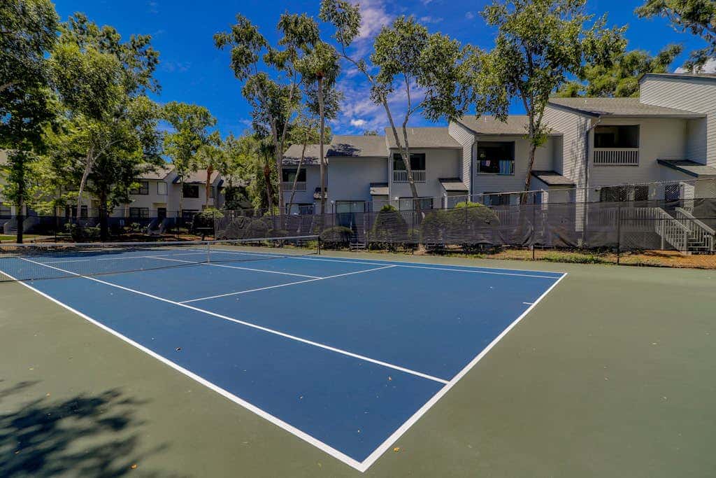 Coastal condo with outdoor pool, walk to beach and shopping