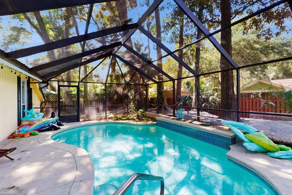 Home with private pool, fenced in yard, dog-friendly, walk to beach