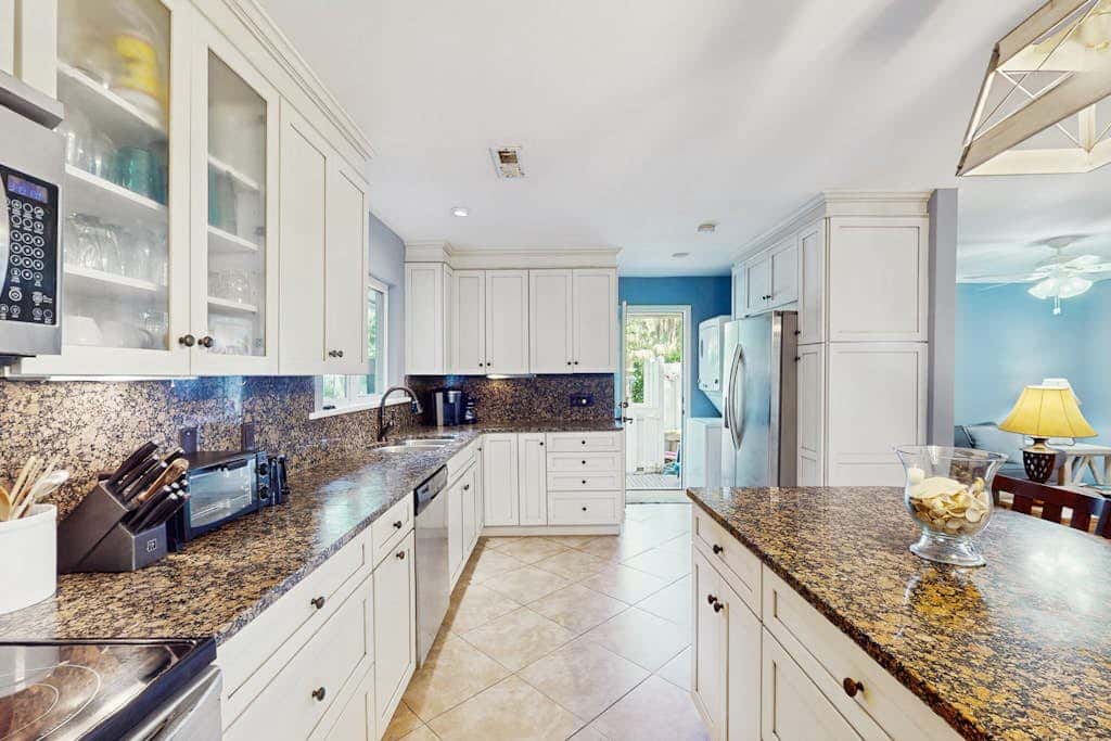 Home with private pool, fenced in yard, dog-friendly, walk to beach