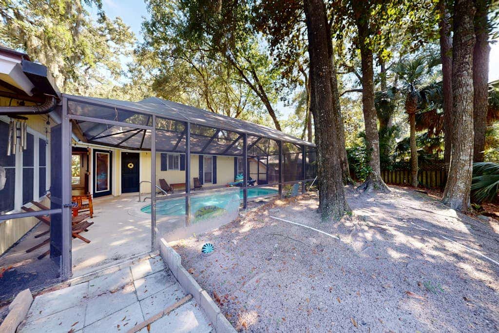 Home with private pool, fenced in yard, dog-friendly, walk to beach