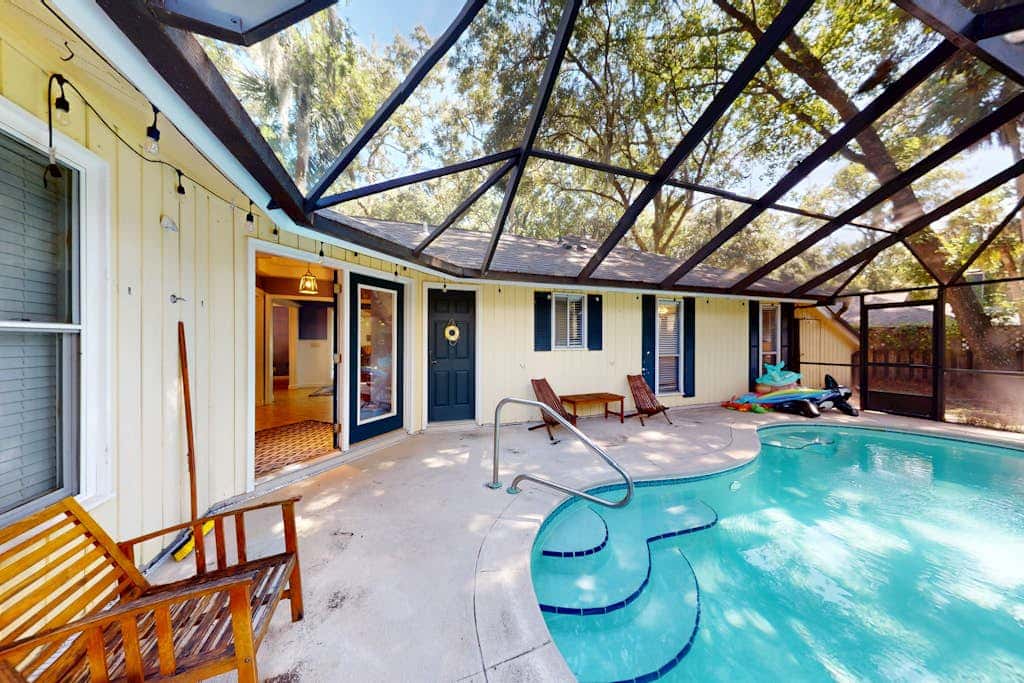 Home with private pool, fenced in yard, dog-friendly, walk to beach