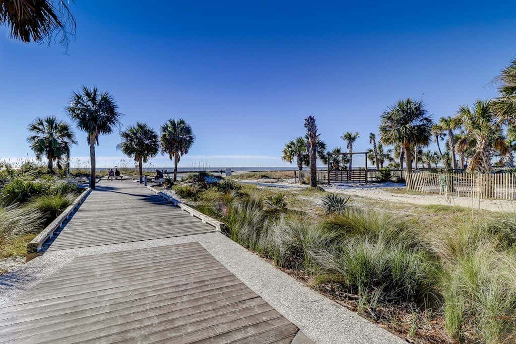 Home with private pool, fenced in yard, dog-friendly, walk to beach