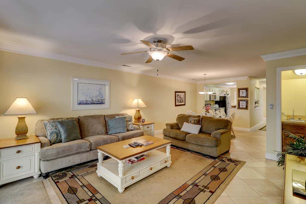 Beautifully remodeled villa with WiFi, inviting porch & balconies walk to beach