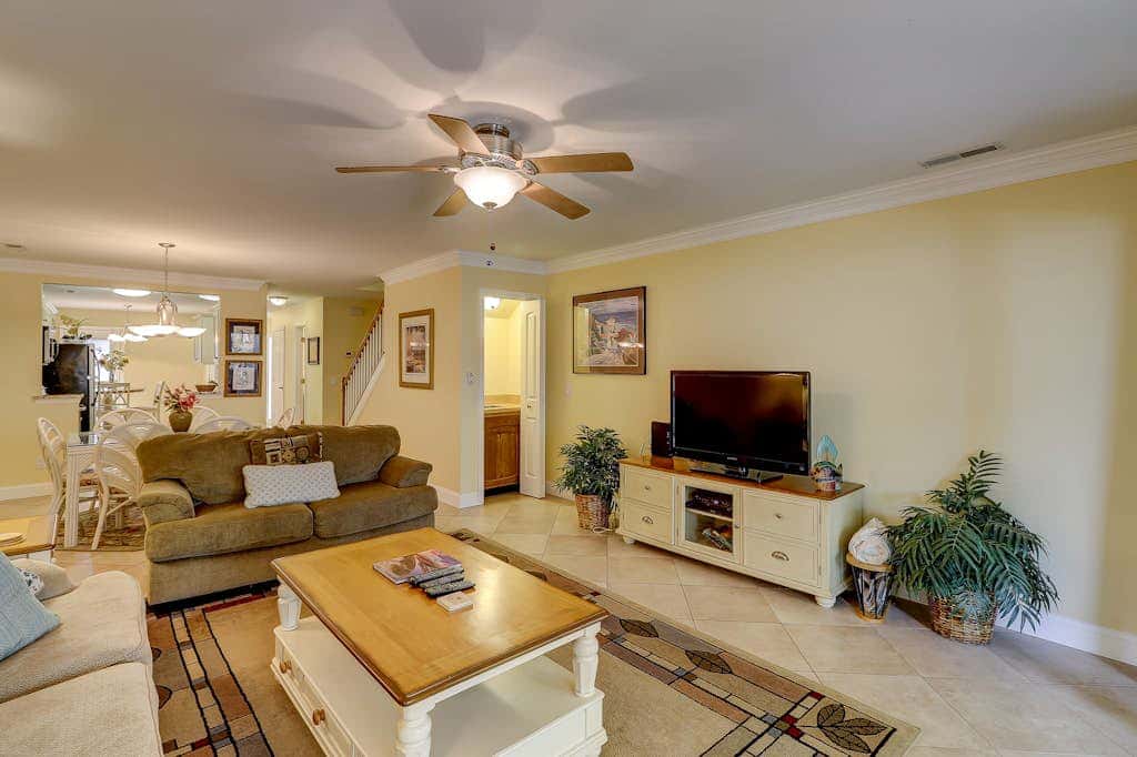 Beautifully remodeled villa with WiFi, inviting porch & balconies walk to beach