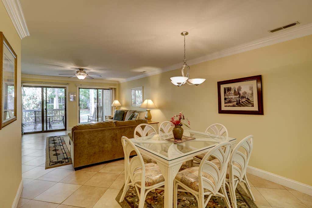 Beautifully remodeled villa with WiFi, inviting porch & balconies walk to beach