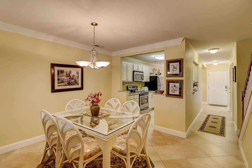 Beautifully remodeled villa with WiFi, inviting porch & balconies walk to beach