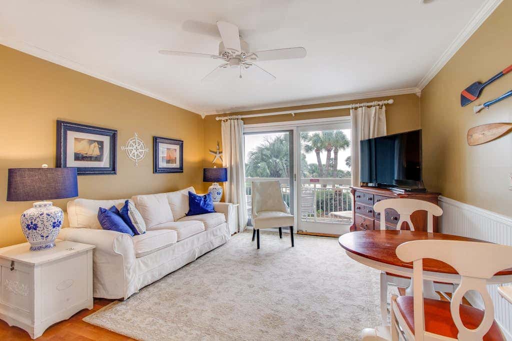 Beachside Condo with Shared Pool & Private Balcony Retreat