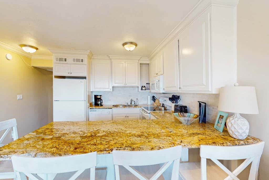 Coastal Condo with Shared Pool  Steps to the Beach, Walking Distance to Shopping and Dining