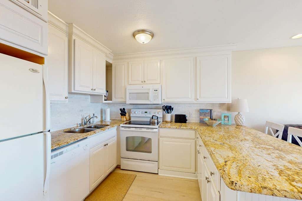 Coastal Condo with Shared Pool  Steps to the Beach, Walking Distance to Shopping and Dining