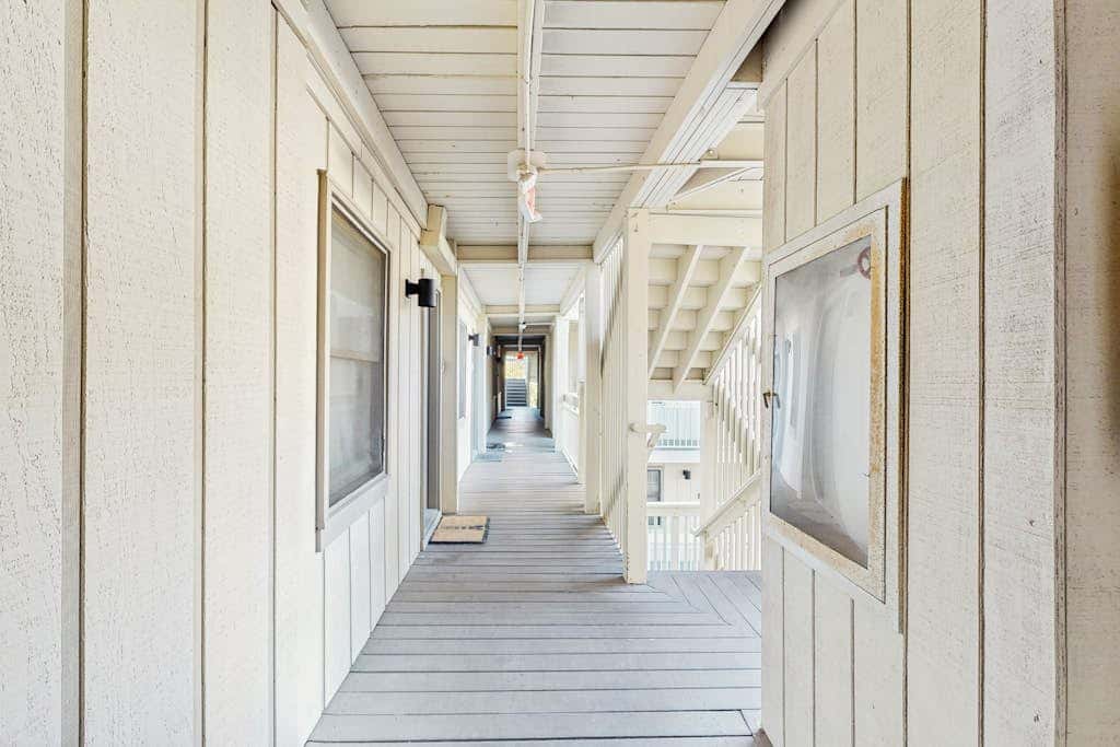 Coastal Condo with Shared Pool  Steps to the Beach, Walking Distance to Shopping and Dining