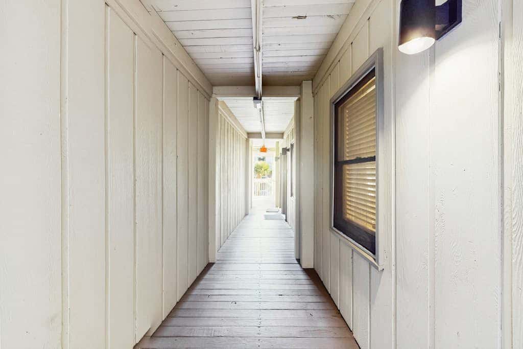 Coastal Condo with Shared Pool  Steps to the Beach, Walking Distance to Shopping and Dining