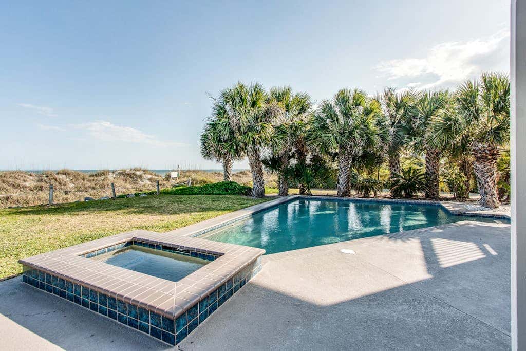 Beachfront home with private pool, expansive deck & breathtaking views