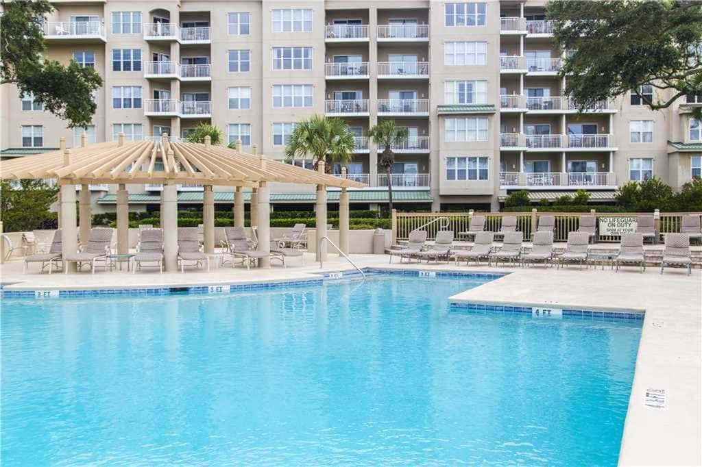 Coastal condo on the beach with panoramic views, beach access & a shared pool