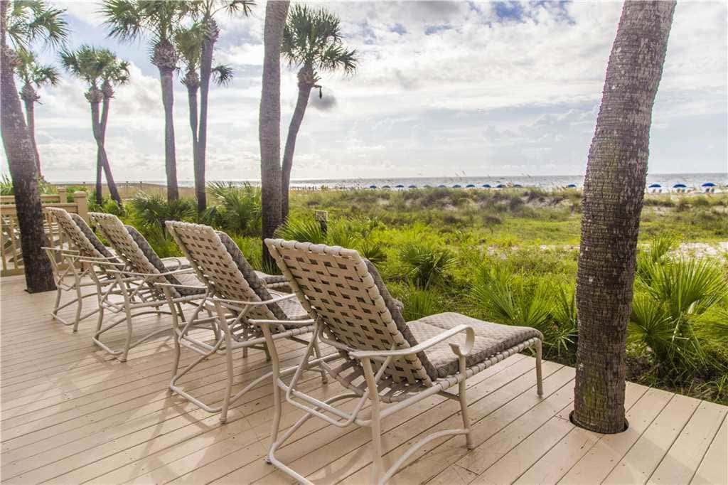 Coastal condo on the beach with panoramic views, beach access & a shared pool