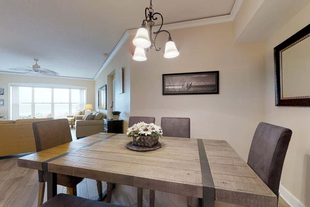 Dreamy condo on the beach with balcony view, shared pool, & charming decor
