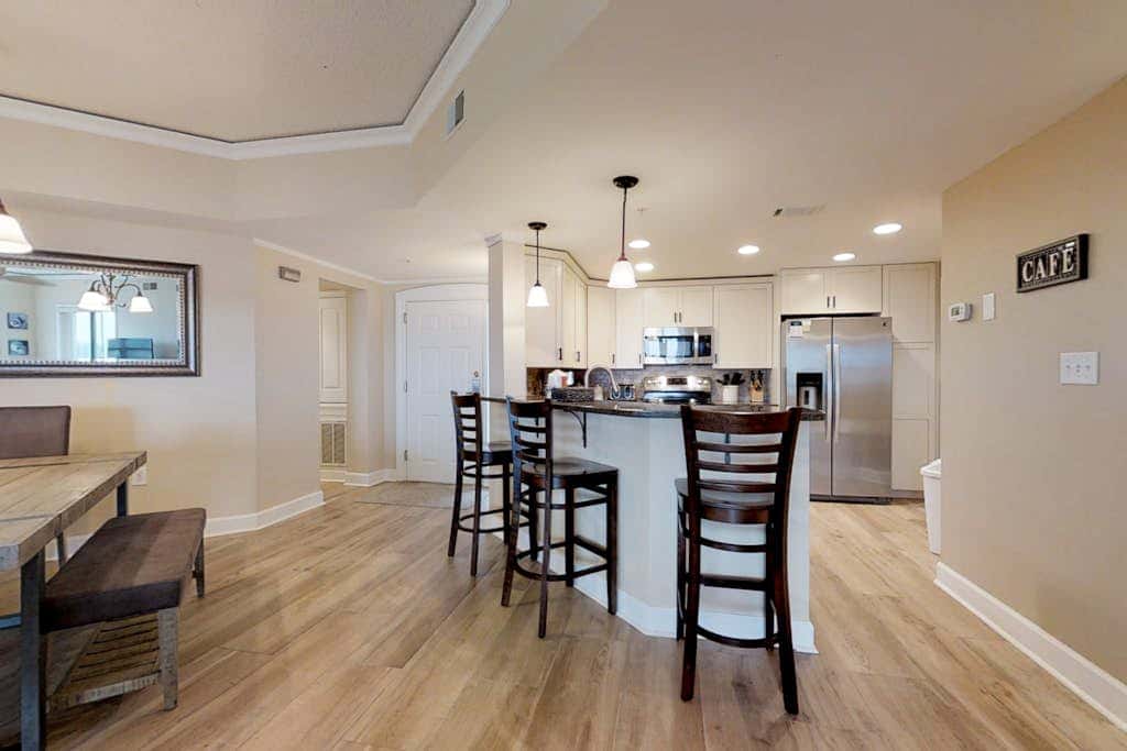 Dreamy condo on the beach with balcony view, shared pool, & charming decor