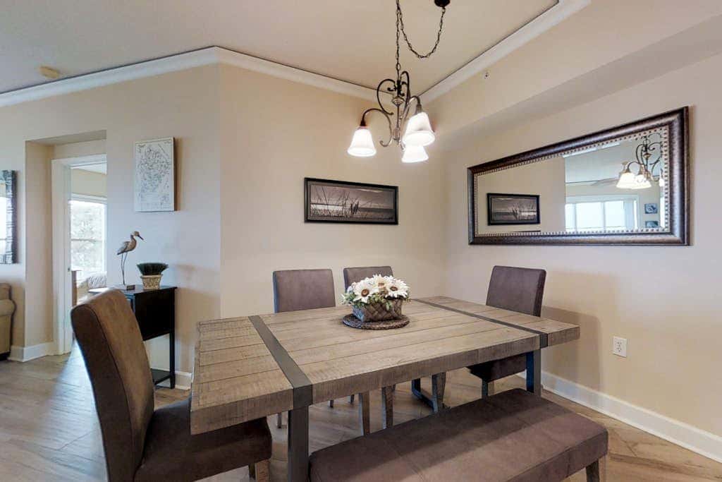 Dreamy condo on the beach with balcony view, shared pool, & charming decor