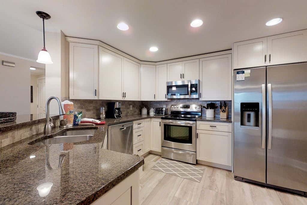 Dreamy condo on the beach with balcony view, shared pool, & charming decor