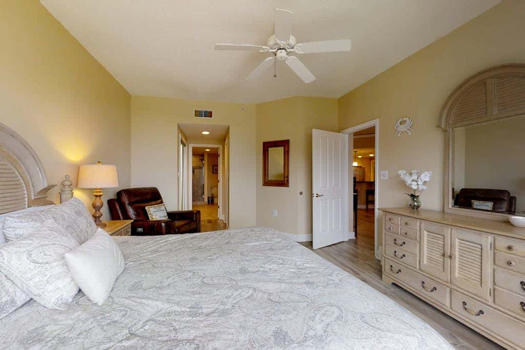 Dreamy condo on the beach with balcony view, shared pool, & charming decor