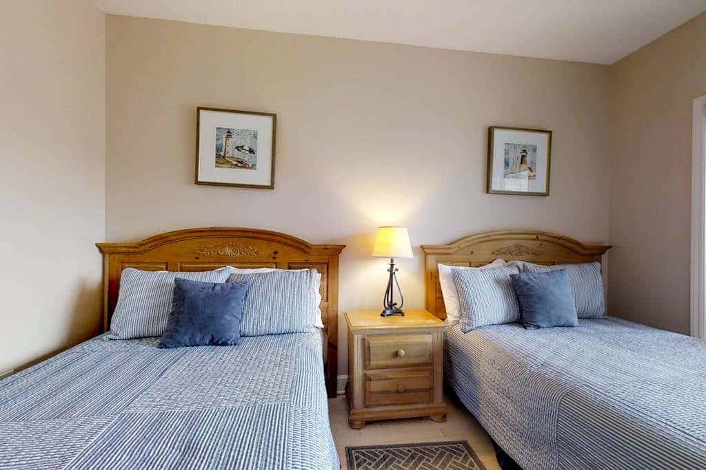 Dreamy condo on the beach with balcony view, shared pool, & charming decor