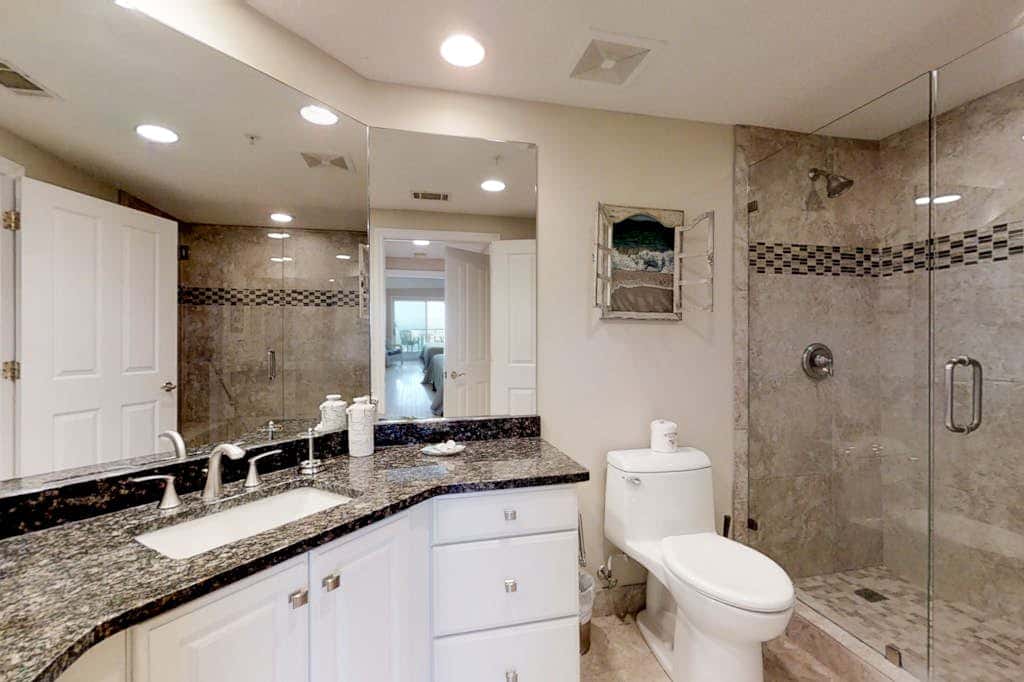 Dreamy condo on the beach with balcony view, shared pool, & charming decor
