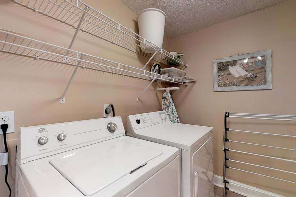 Dreamy condo on the beach with balcony view, shared pool, & charming decor