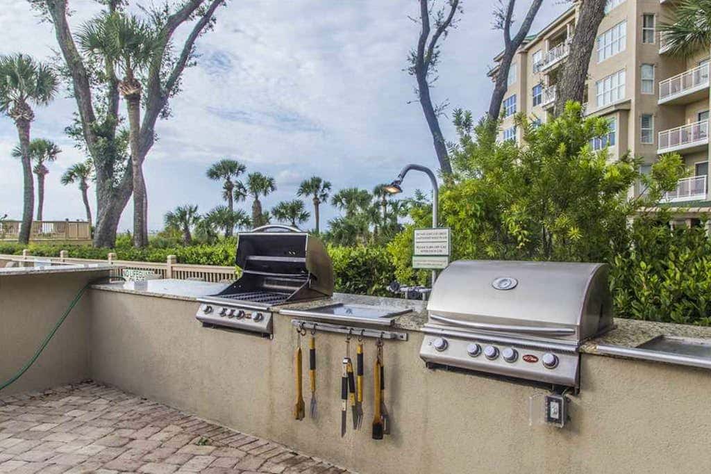 Dreamy condo on the beach with balcony view, shared pool, & charming decor