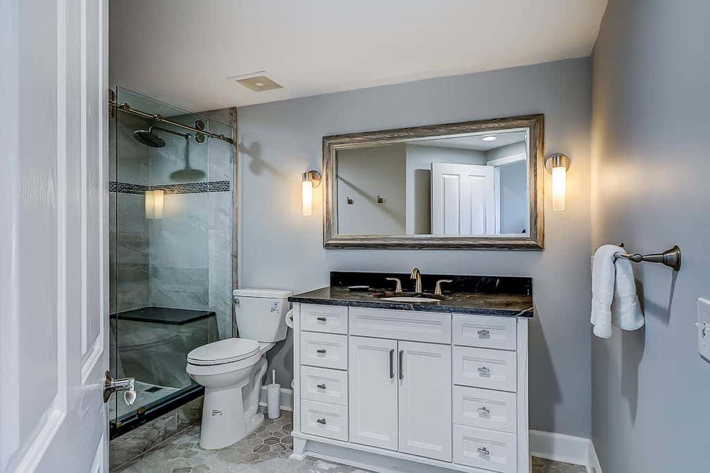 Corner condo with panoramic view & wraparound deck, just steps from the water