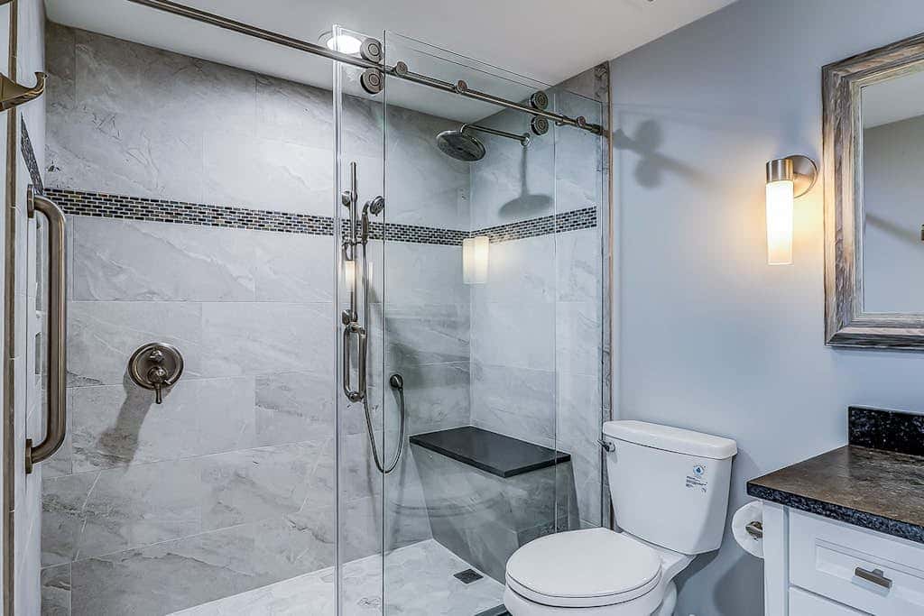 Corner condo with panoramic view & wraparound deck, just steps from the water
