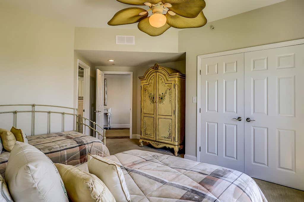 Corner condo with panoramic view & wraparound deck, just steps from the water