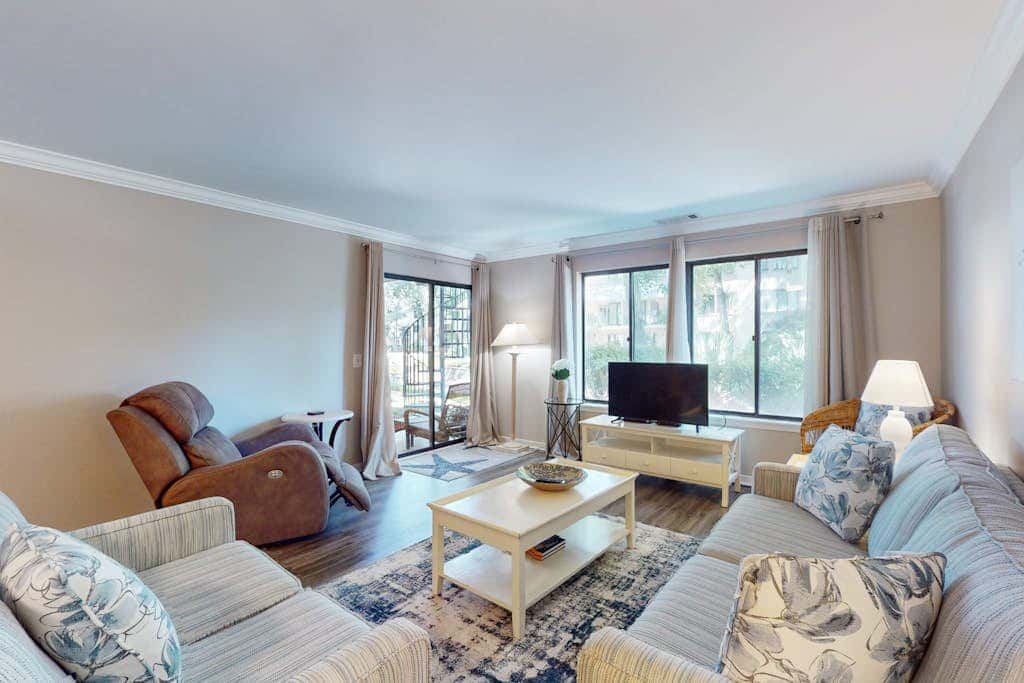 Snow Bird Friendly, ground floor island gem with pool access walk to beach