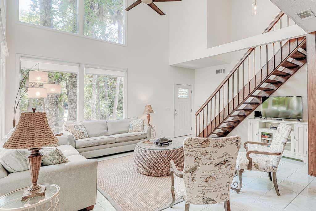 Dog friendly home with an enclosed yard, pool deck, & private pool