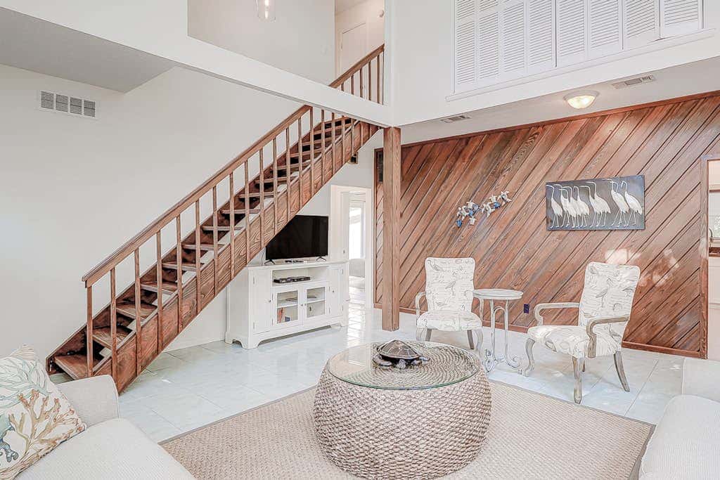 Dog friendly home with an enclosed yard, pool deck, & private pool
