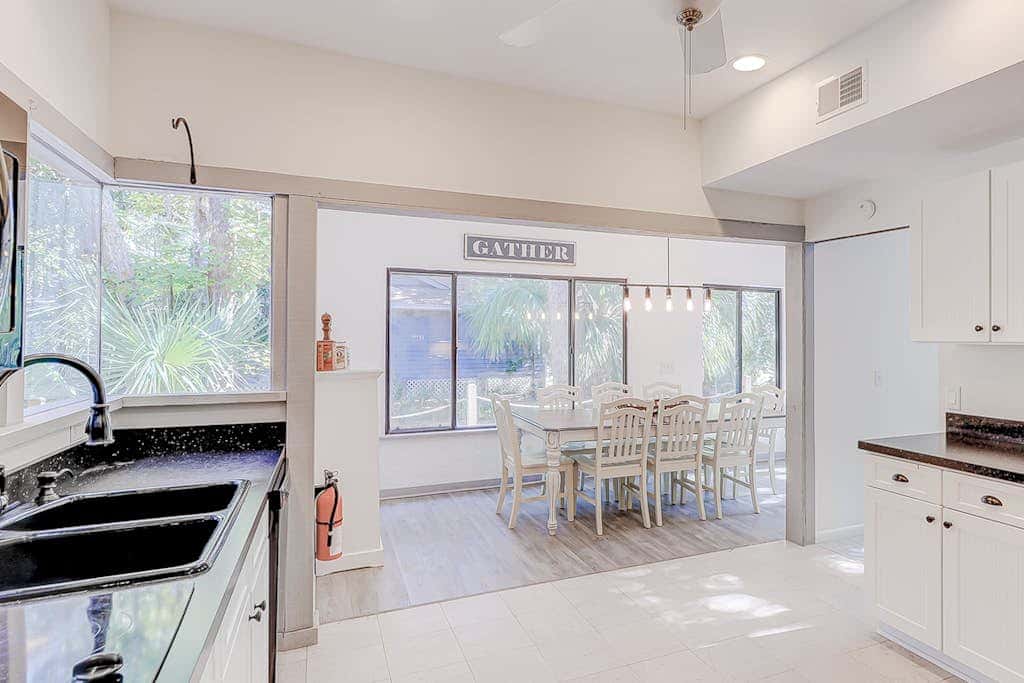 Dog friendly home with an enclosed yard, pool deck, & private pool